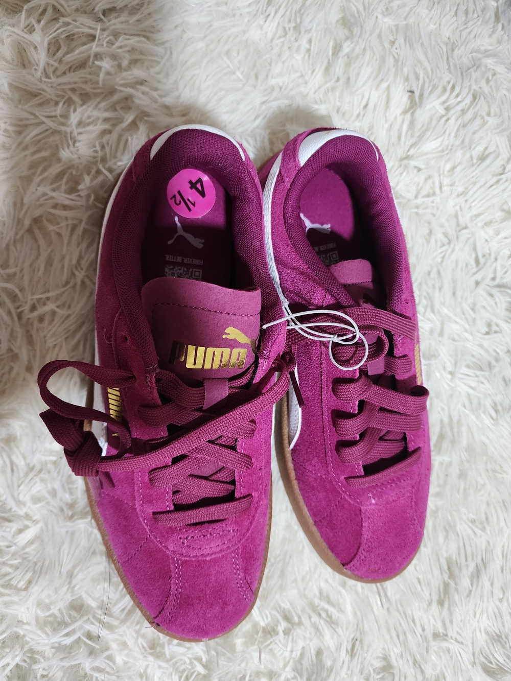 Puma Suede Sneakers in Magenta with Gold Logo